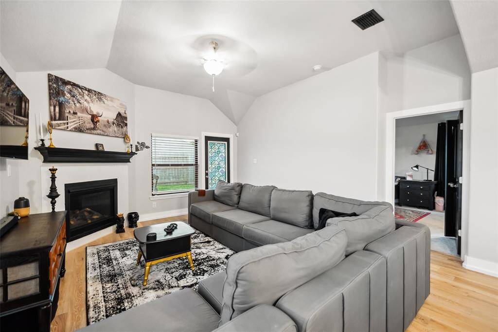The glass door leads to the covered back patio.