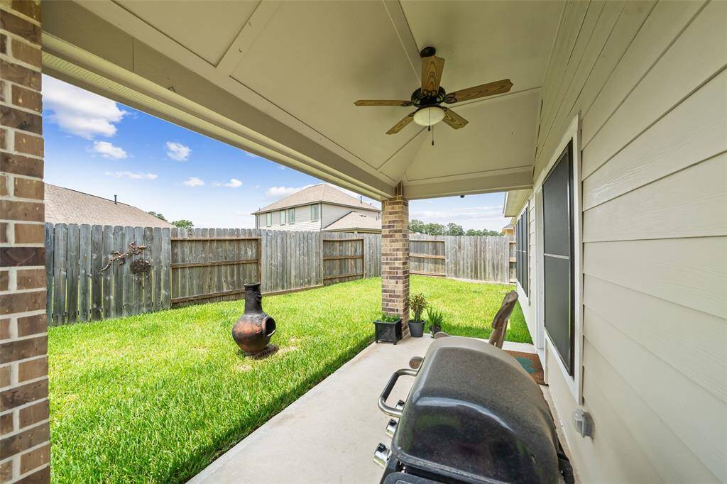 Sit in the shade under the cool breeze of the ceiling fan.