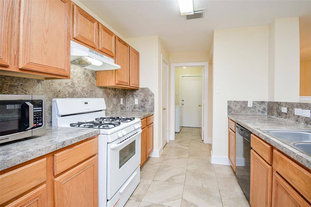 Another view of Kitchen - leading to Utility Room