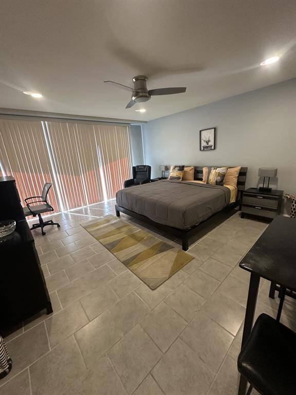 King room has massage recliner, dresser, dinette, desk w/chair, 2 nightstands, walk in closet and refrig and microwwave, private full bathroom, cabinets, balcony