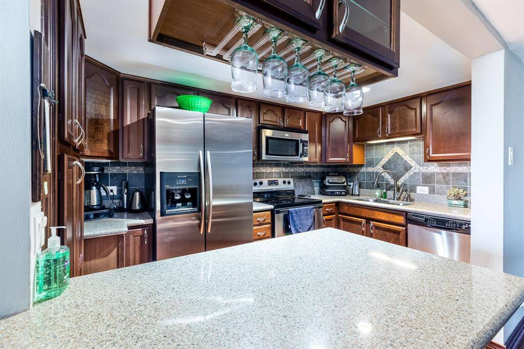 Breakfast bar and plenty of room to cook, all dishes, pots/pans, even spices