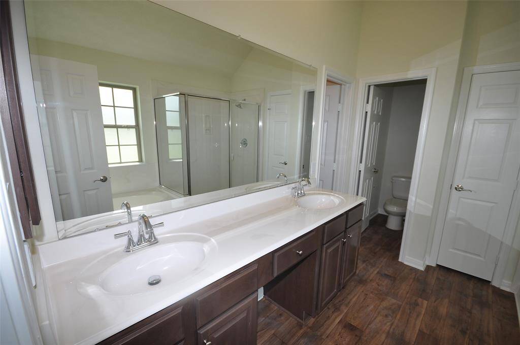 Dual vanities in the master bath.