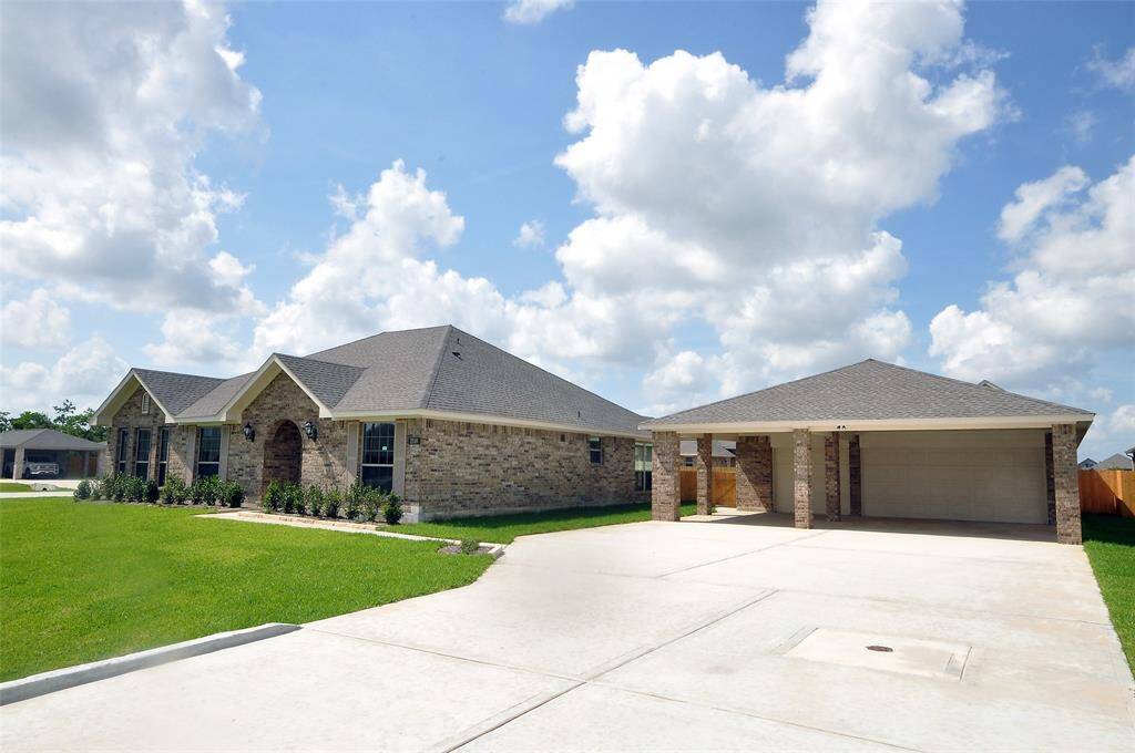 Wide drive to a large Garage. The neighborhood has plentiful of off street parking for you and your neighbors.