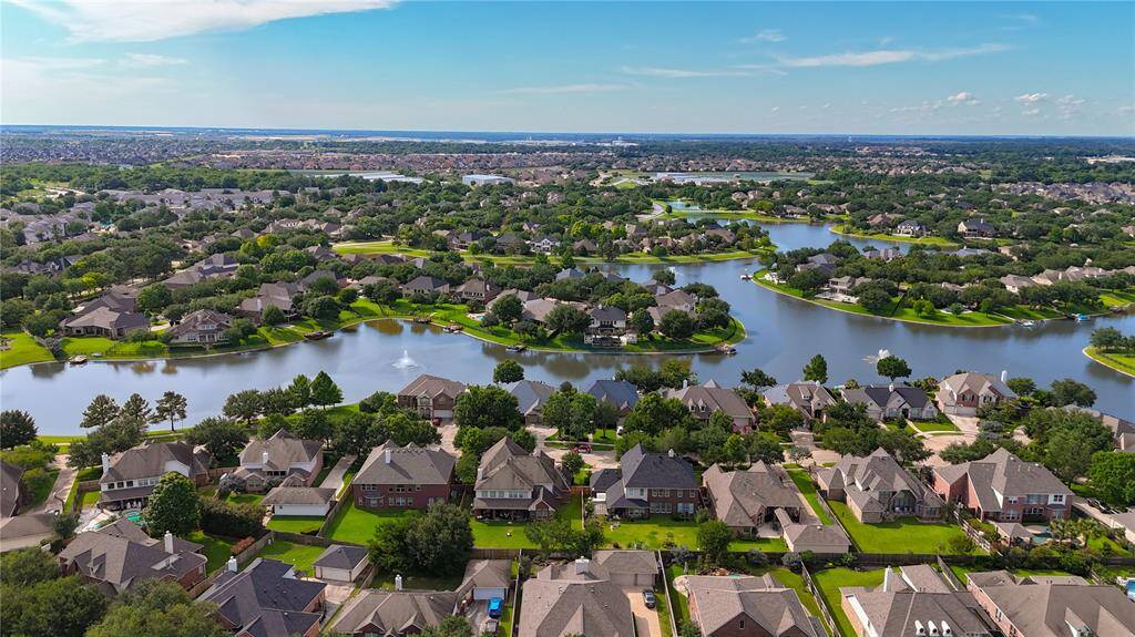Aerial view of the neighborhood and surrounding lakes.