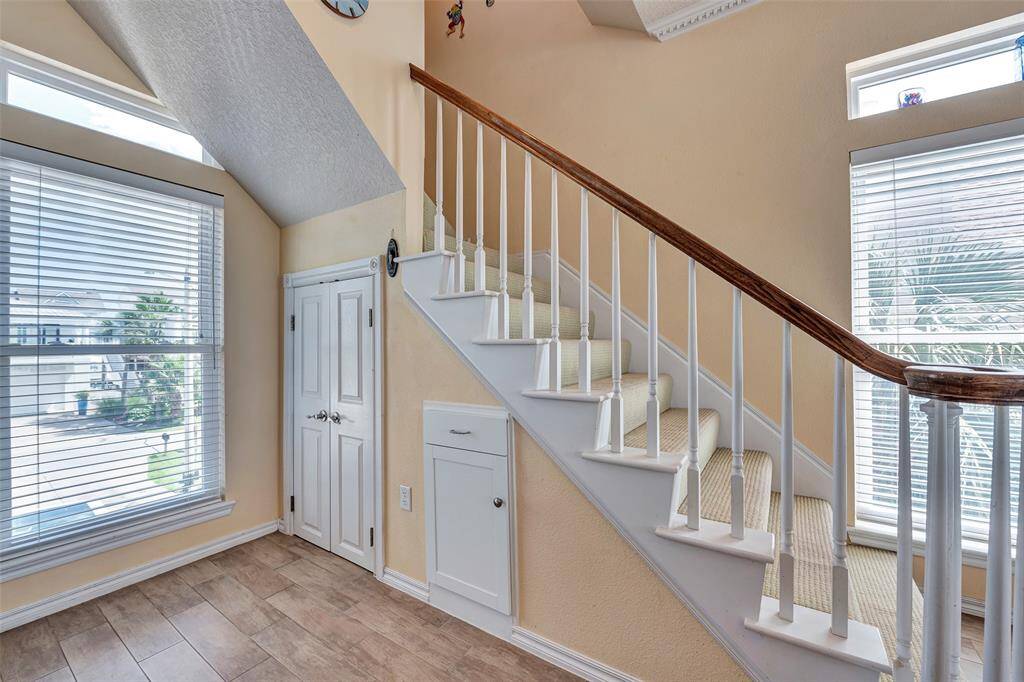 Tucked neatly beneath the staircase, the pantry offers clever use of space without sacrificing design. This area adds both charm and functionality to the heart of the home.