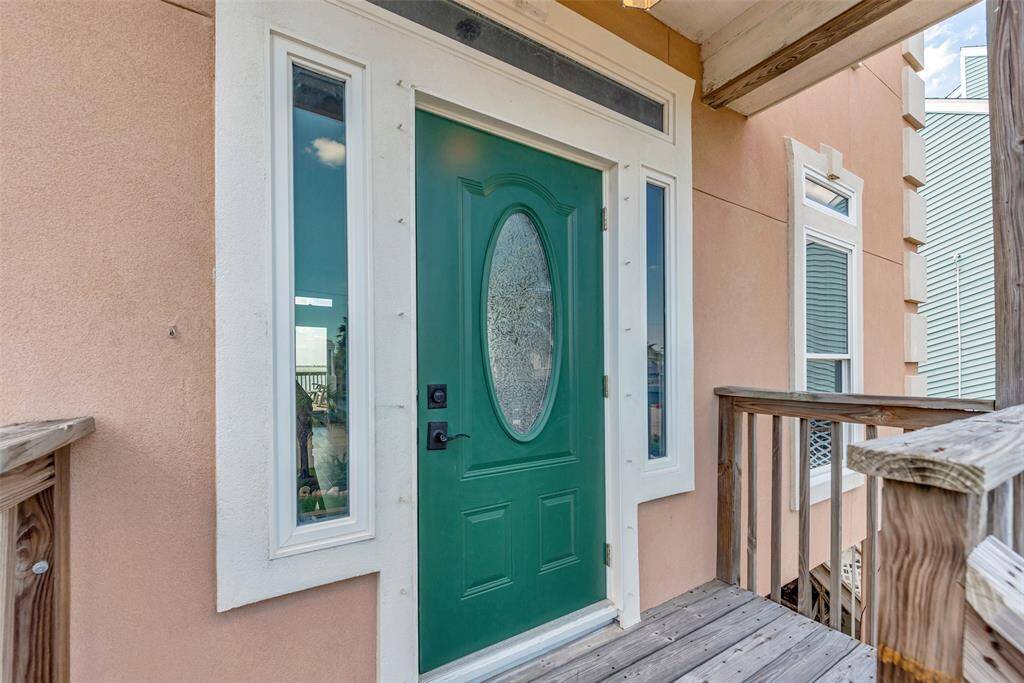 Greet guests with charm at the covered front Entry featuring a decorative oval-glass front door framed by sidelights that bring in natural light.