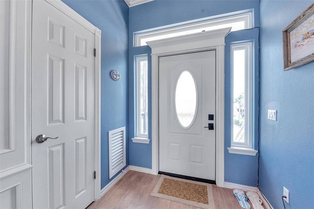 Step inside to a bright and welcoming entry and a convenient coat closet for added storage.