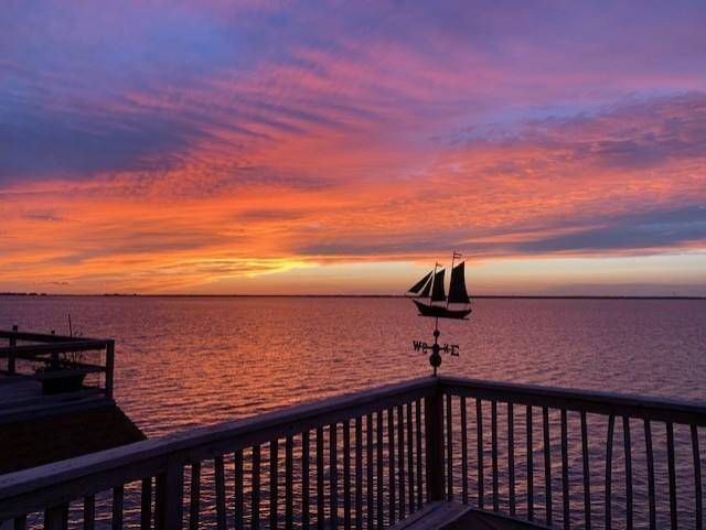 The spacious waterfront deck offers a private backdrop of sunsets that you'll look forward to every evening.