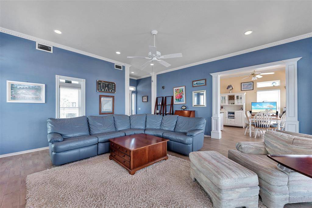 Spacious and Versatile – This large main living area offers flexible layout options with room for oversized furniture, display space for art or shelving, and smooth flow into the adjacent dining and kitchen areas. Ideal for everyday comfort and easy entertaining.
