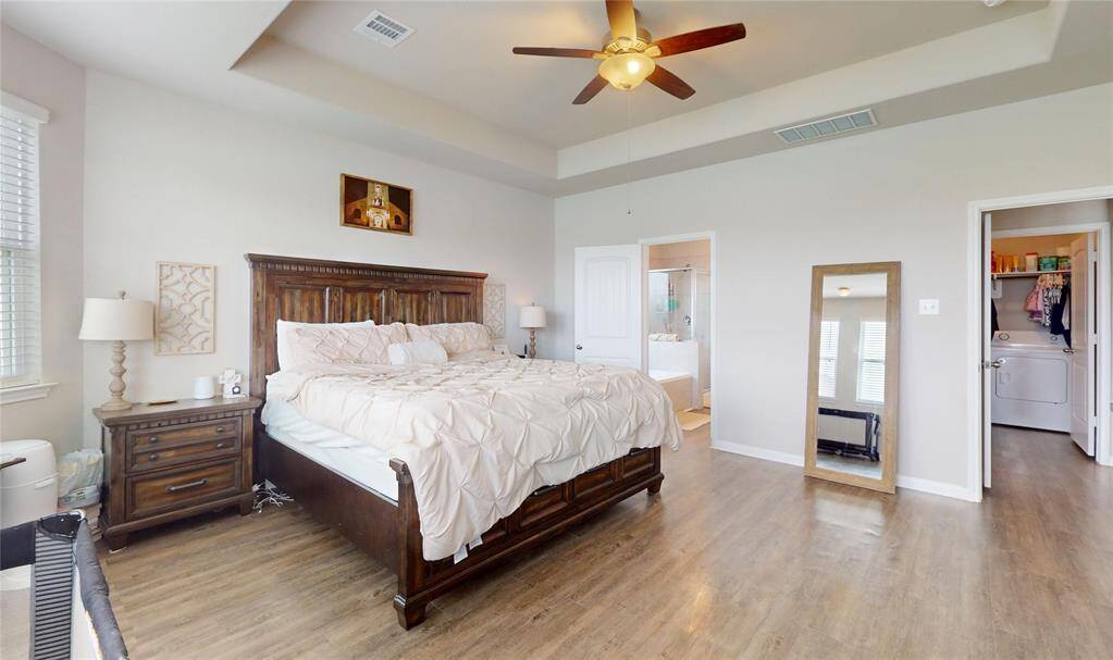 Vaulted ceiling in primary bedroom
