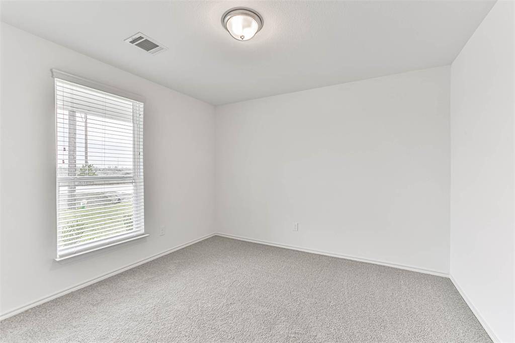 The open concept design seamlessly connects it to the kitchen and dining area, fostering an atmosphere of togetherness.