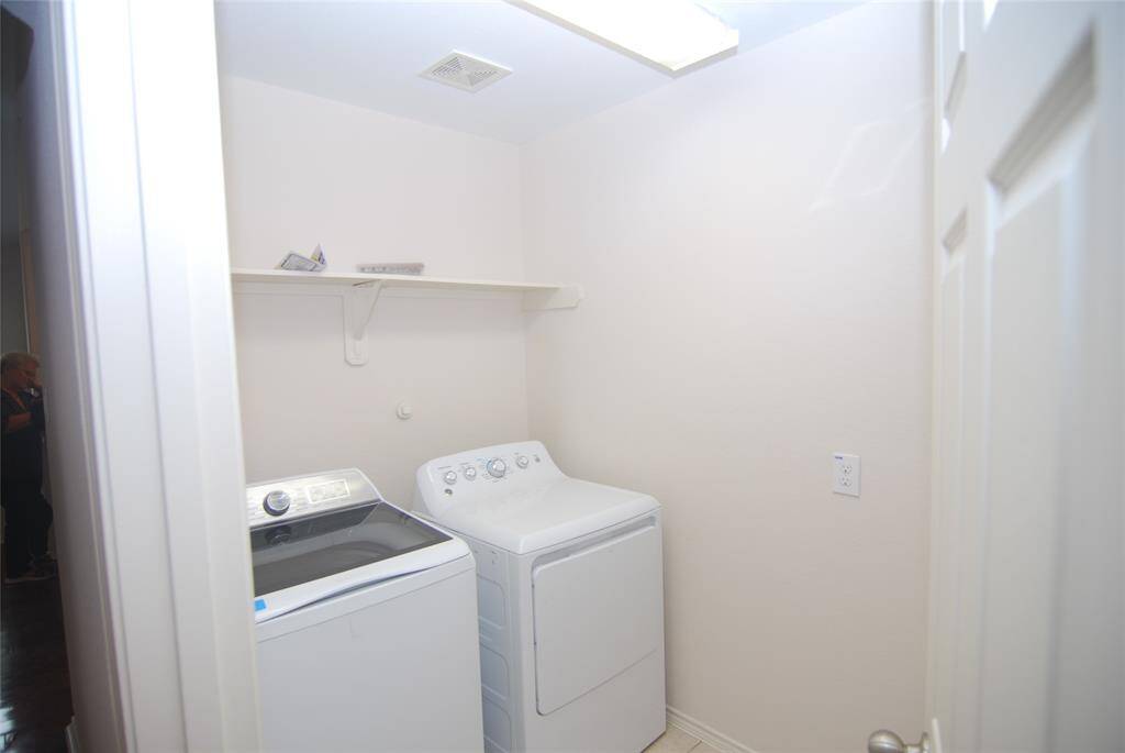 Laundry room - washer and dryer come with the home.