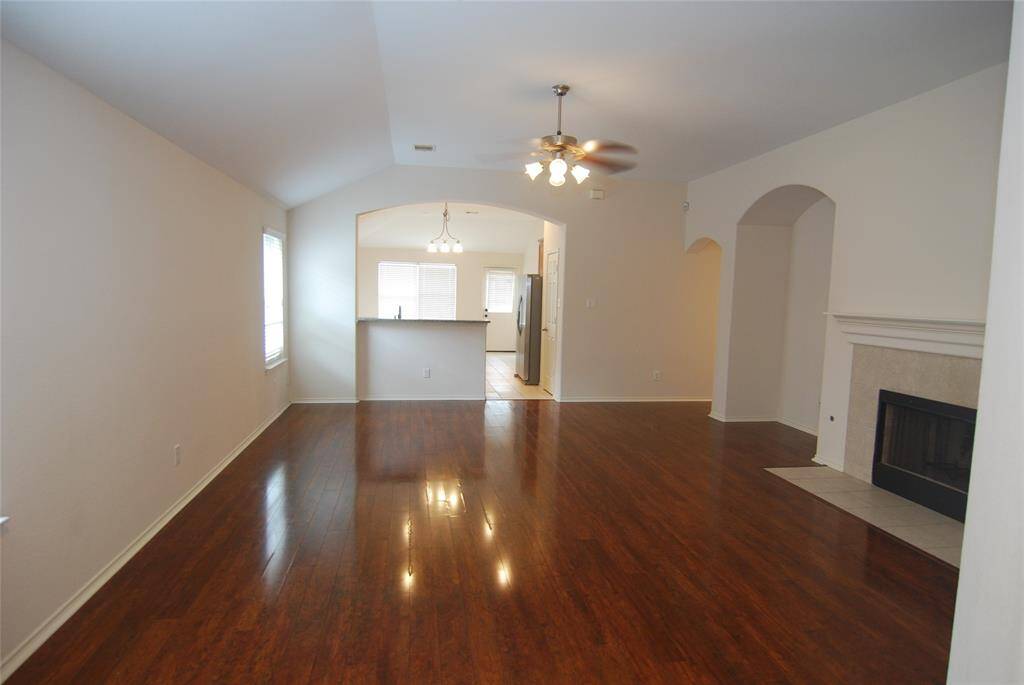 Open concept living! Laminate floors! (Must see in person - photo makes it appear too orange)