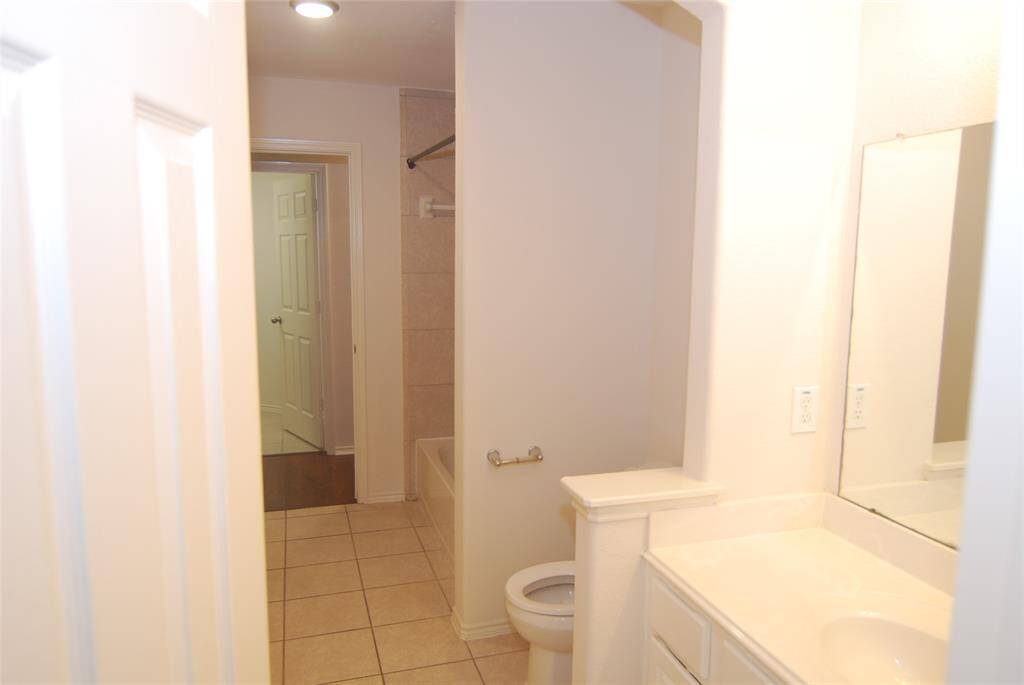 This bathroom connects the hallways so is usable by all bedrooms.