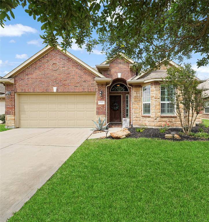 Bright and elegant foyer with high ceilings and tile flooring – a stunning first impression!
