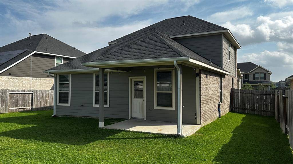 Enjoy summer BBQs on the spacious covered patio.