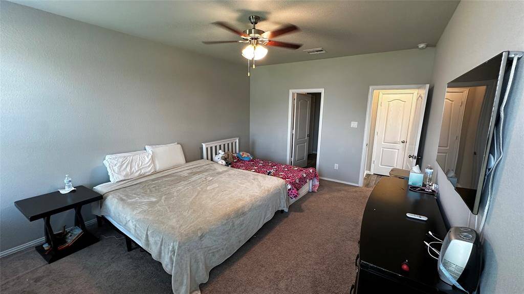 Expansive primary bedroom for ultimate comfort.
