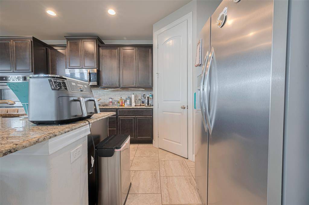 Granite top kitchen with backsplash