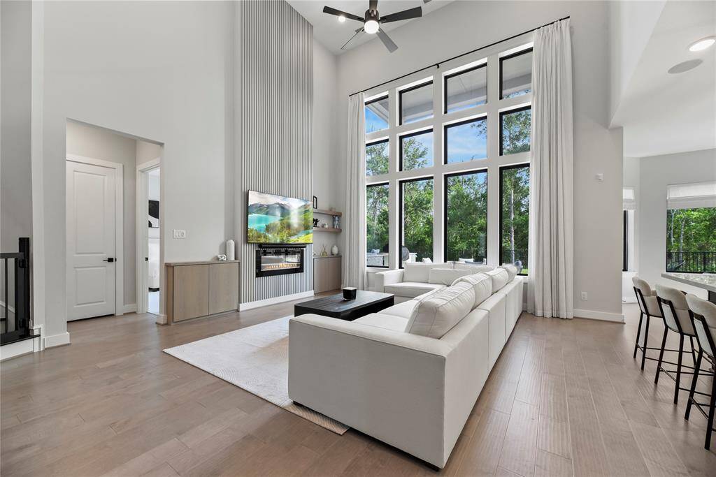 Wall of windows allow for natural light to shine through.
