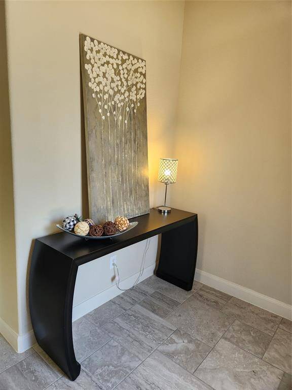 Welcoming entrance for guests and art niches throughout the home