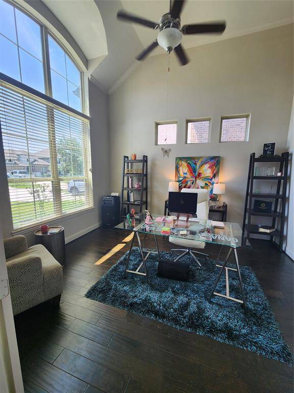 The office has beautiful hardwood floors and tons of natural light is the perfect space to spark your creativity!