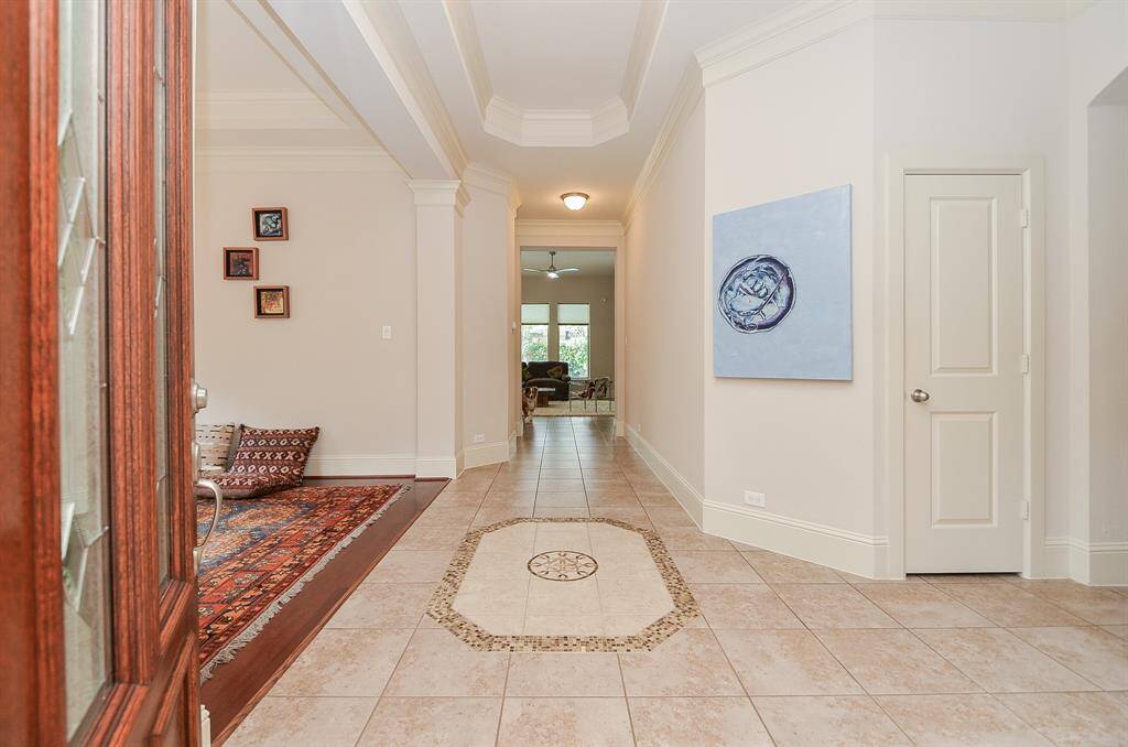 From the main entry, you have a clear view straight ahead to the living area.