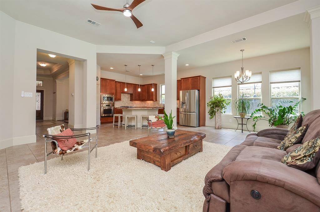 How impressive and truly workable is this divine combined living/kitchen area, with a clear view, right to the front door, left?