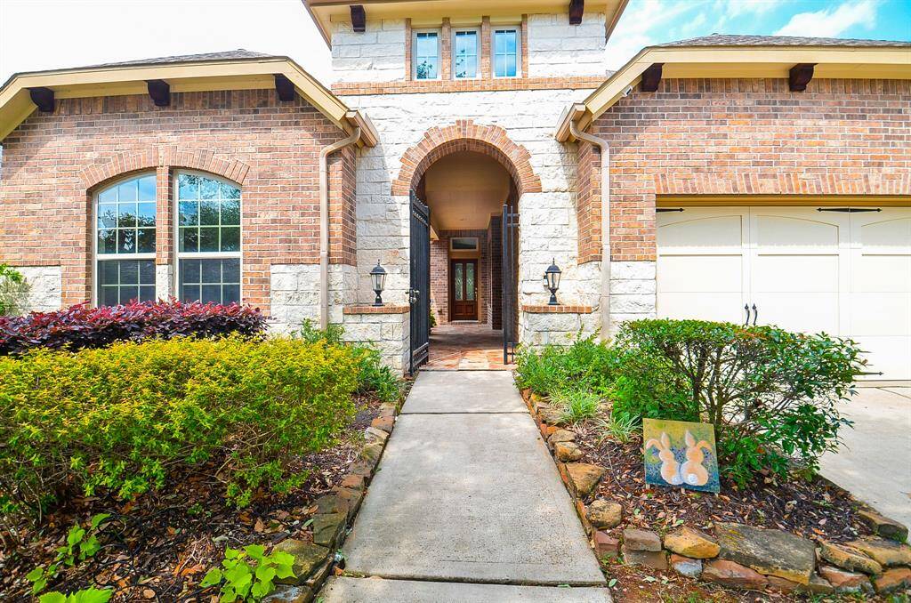 When you think of elegant privacy, remember this view of the main gated, covered entrance.