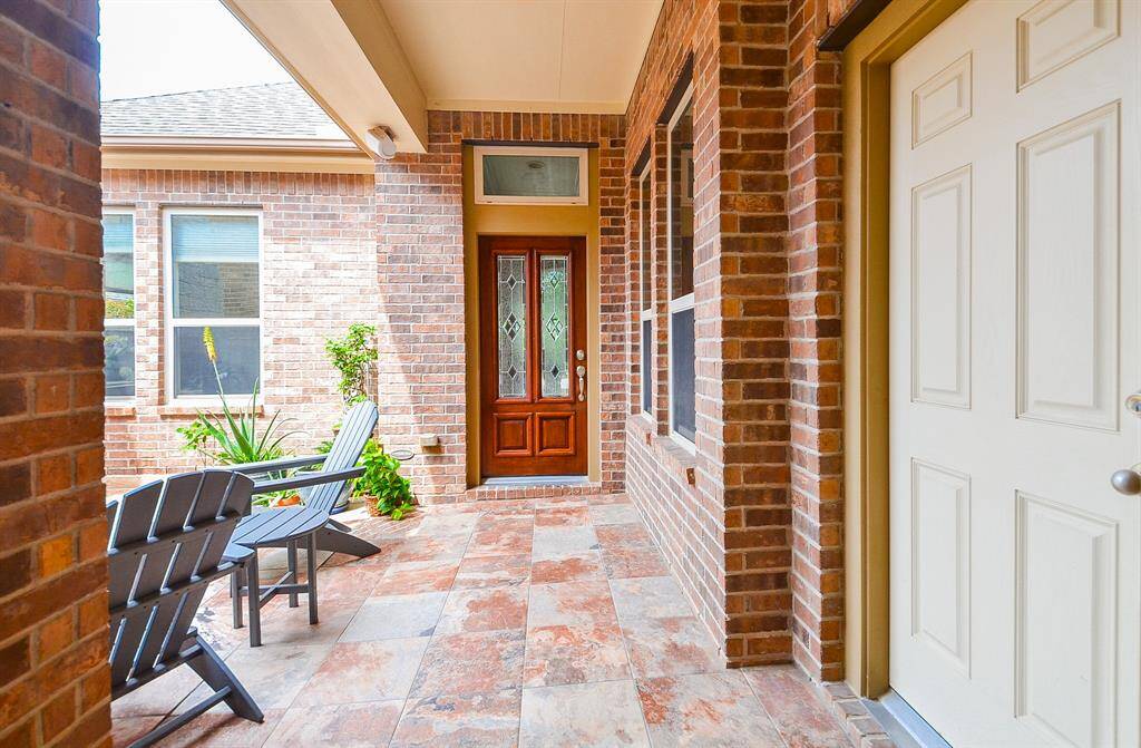 This generous front porch, which shares the beautifully maintained front covered entrance, welcomes comfy seasonal seating and fun garden display pieces, if desired. Inside, are 4 bedrooms and 4 baths, gracing an 8,303 square-foot-lot with 2,534 square-feet of interior living space.