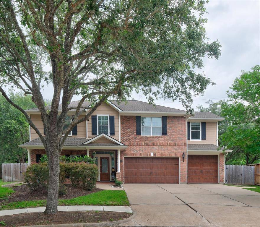 WELCOME HOME! This gorgeous two-story home features a charming mix of brick and siding, complemented by a spacious three-car garage. The front yard is landscaped with mature trees and shrubs, offering a welcoming curb appeal. Ideal for family living.