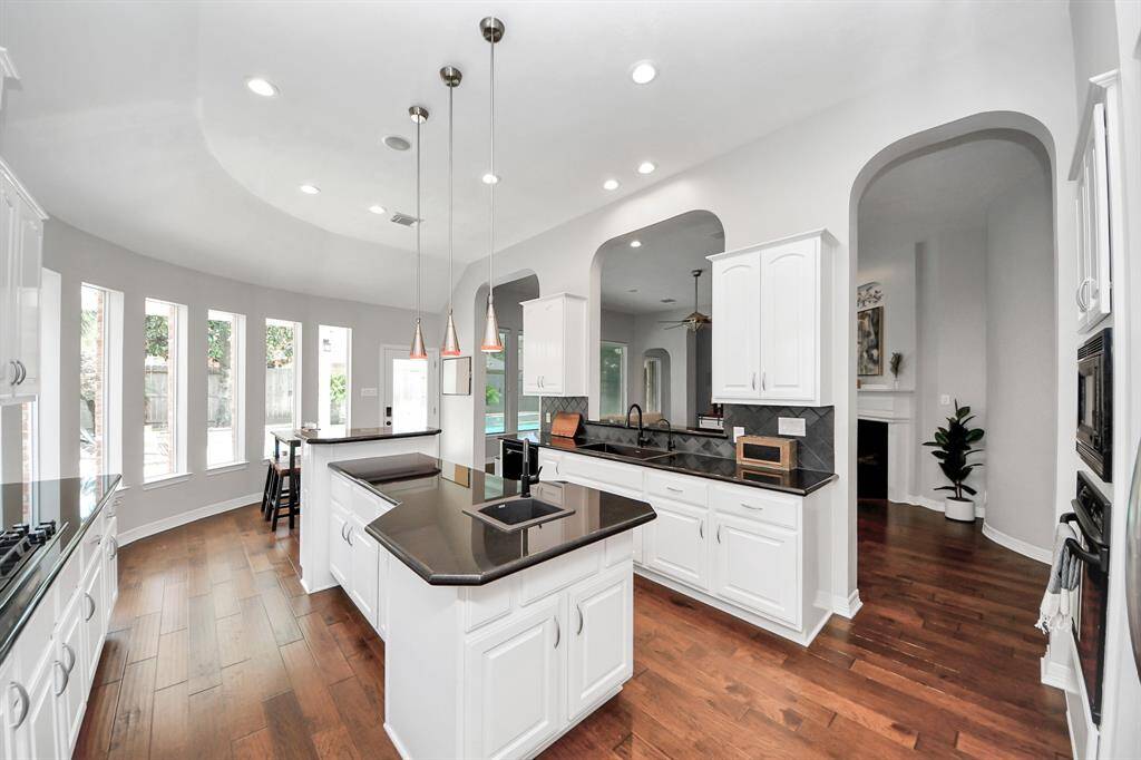 Chief friendly Kitchen w/ recently installed Gas Cook-Top, updated Main & Vegi Sinks and Faucets, and DW
