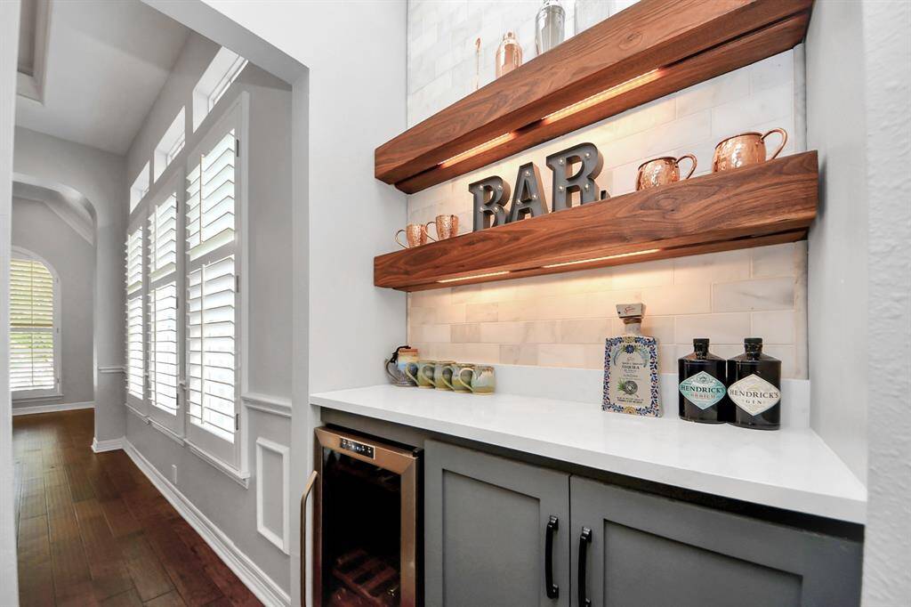 Recently added Custom Dray-Bar area w/ Mini-Fridge & Accent Lights under Floating Shelves