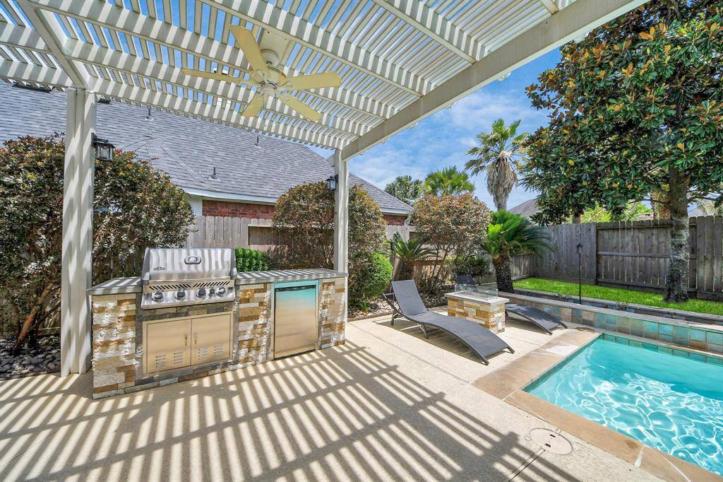 Recently added Custom Grill area w/ Mini-Fridge & Poolside Fire Pit
