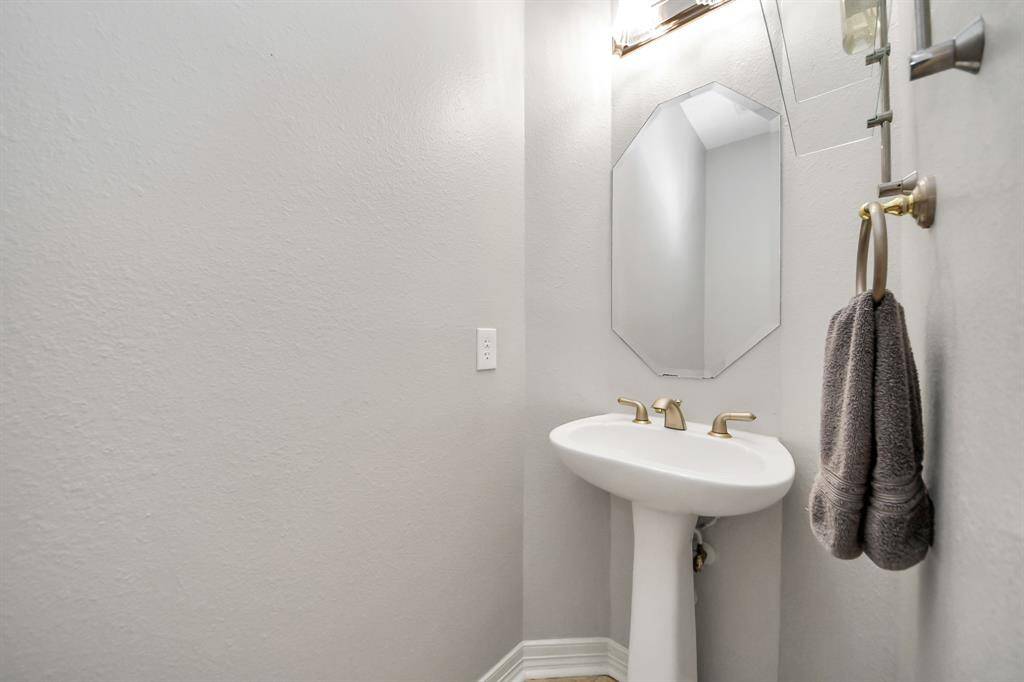 Half bath in long hallway area for privacy