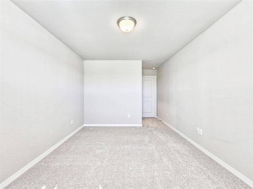 The second of the 2 secondary bedrooms.  Both rooms are spacious and offer nice size closets