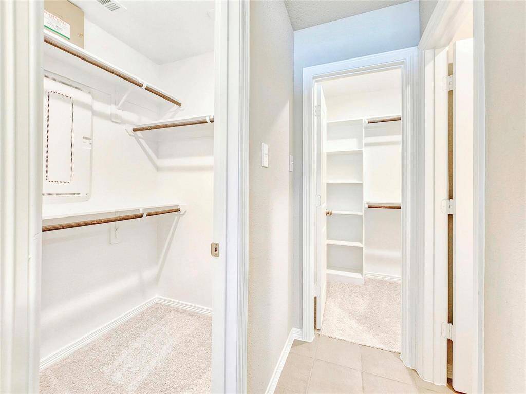 Dual closets and separate water closet are the icing on the cake to this primary suite