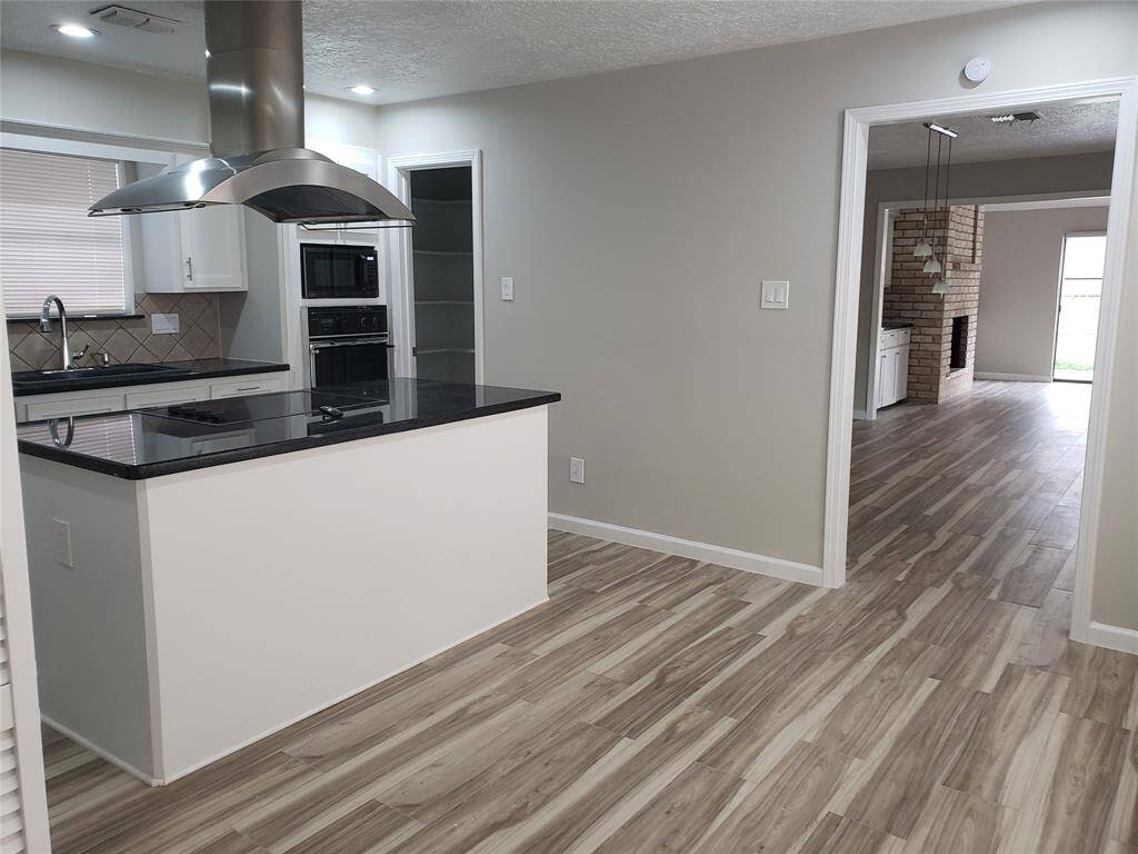 KITCHEN IS NEXT TO THE FORMAL DINING
