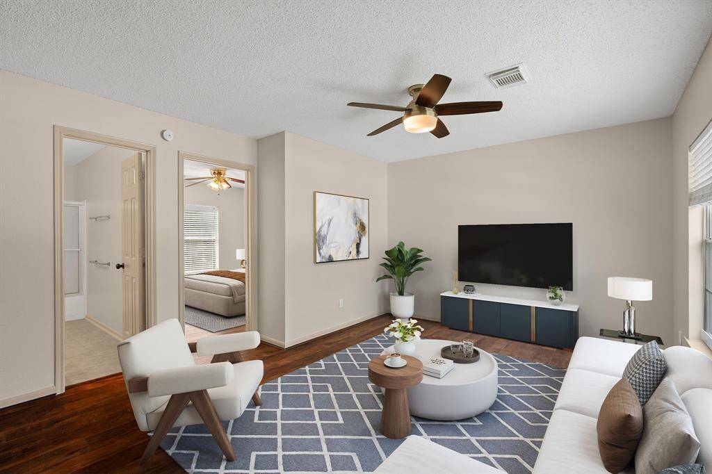 Bathed in abundant natural light, this expansive second-floor game room or flex space provides endless opportunities for entertainment or relaxation, all while overlooking the grand entry below.