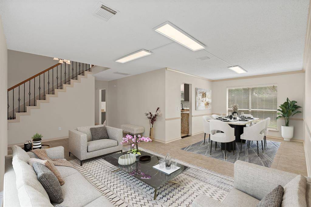 Seamless flow between living and dining in this beautifully virtually staged open floor plan.