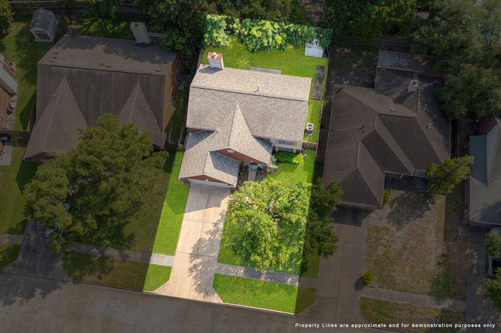A bird's-eye view of your new home, nestled perfectly within this charming neighborhood.