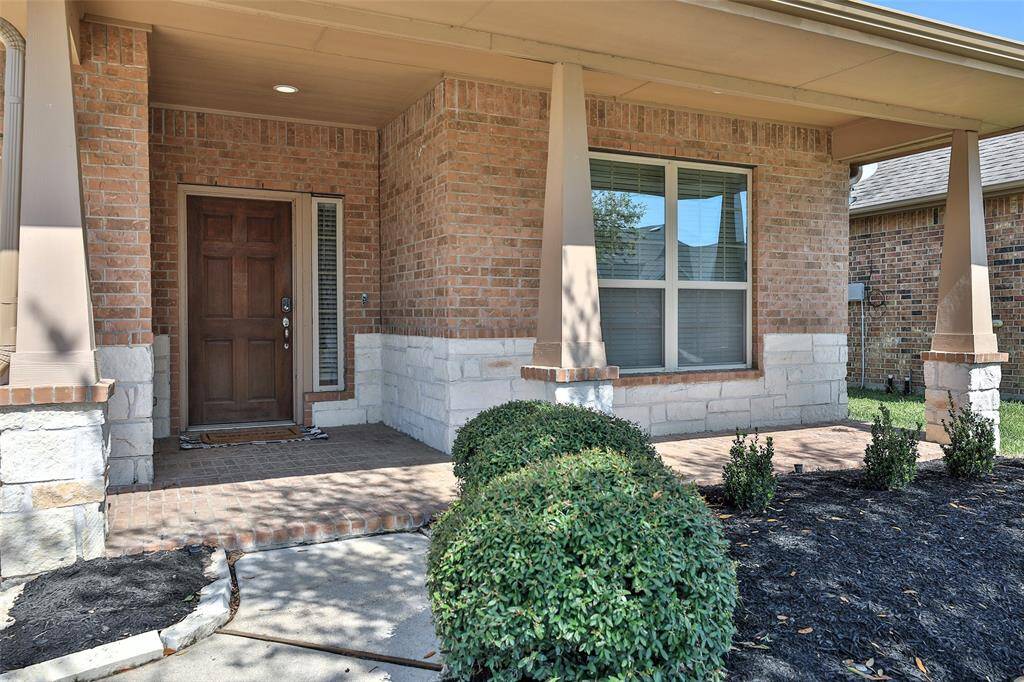 Enjoy relaxing on your extended front porch.