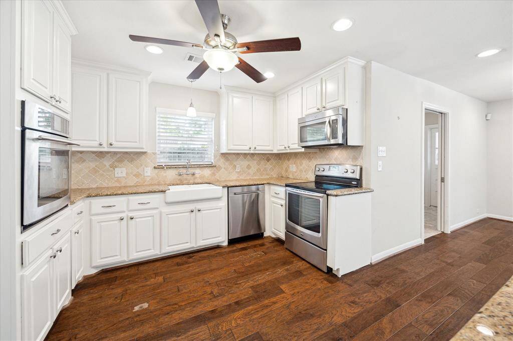 The kitchen adjoins the breakfast and family rooms, creating an easy flow for daily living