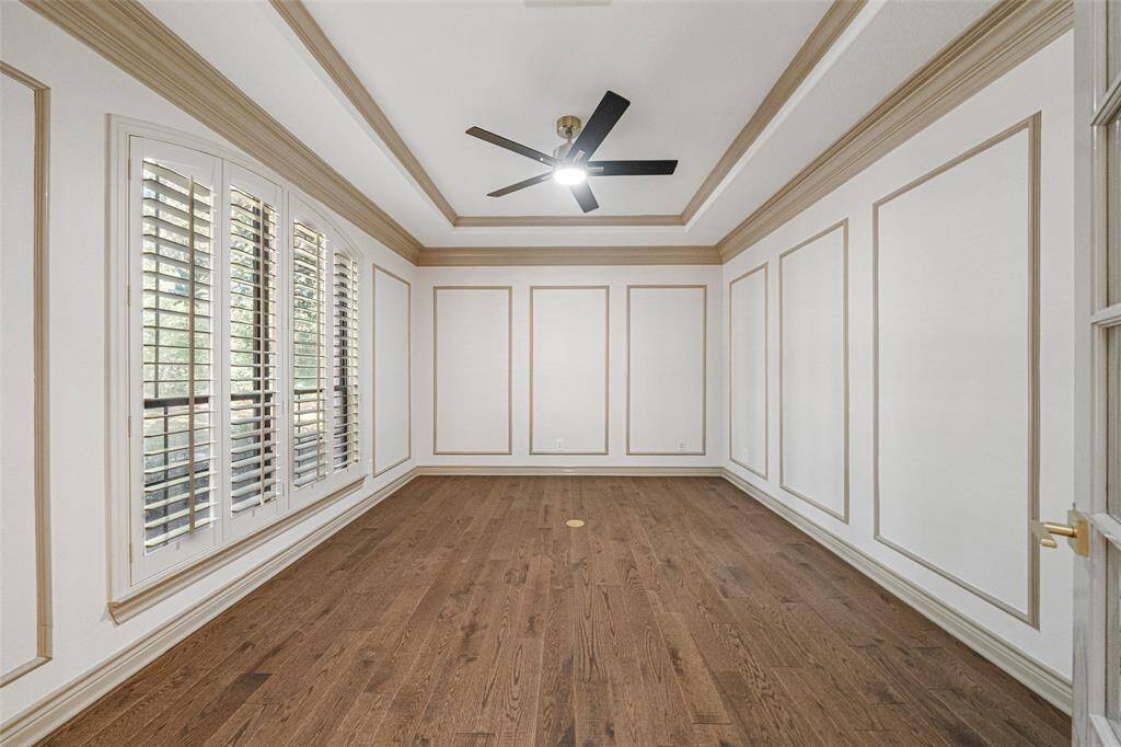 STUDY  French Doors for privacy. Faces the front of the home. New LED integrated lighted big blade ceiling fan