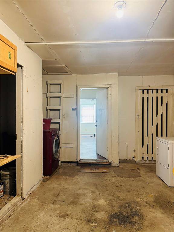 Washer and dryer in garage.