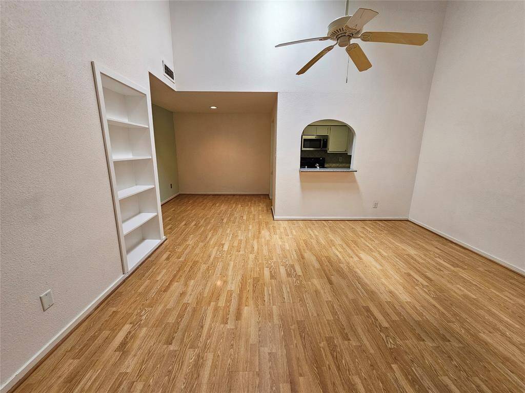 Living room open to the dining and kitchen