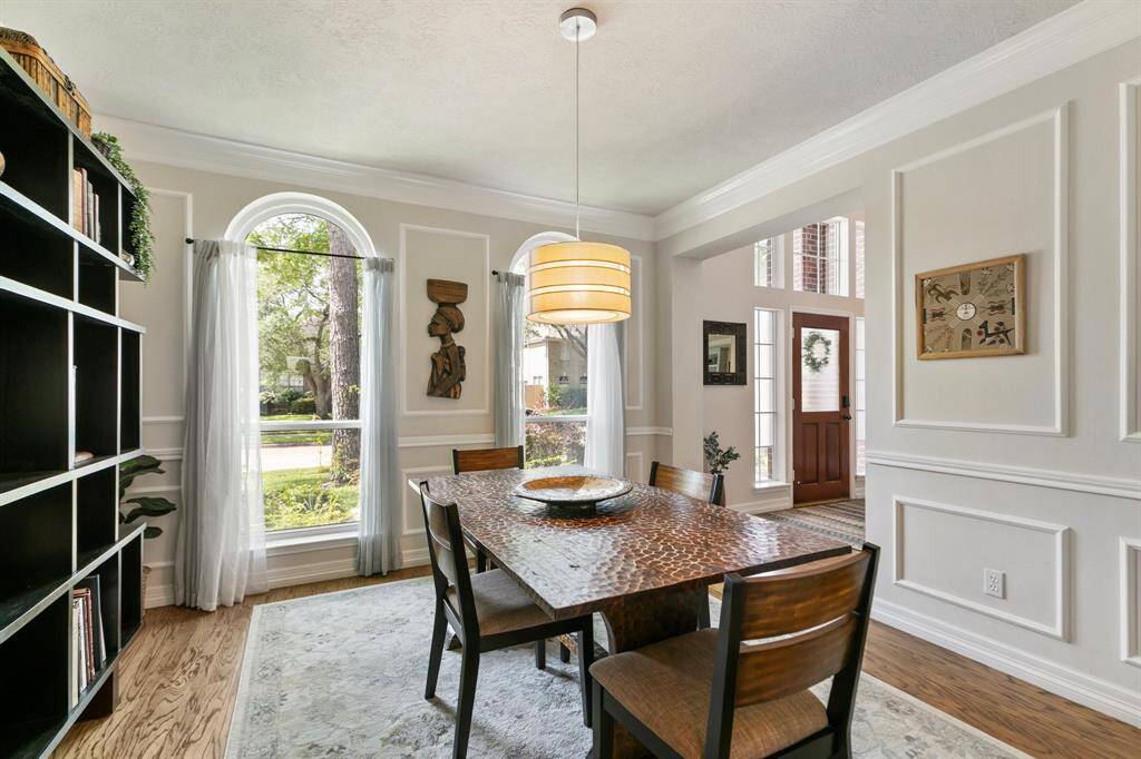 Formal dining room with loads of natural light