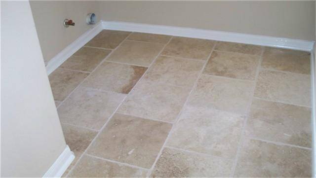 Laundry room with new travertine.