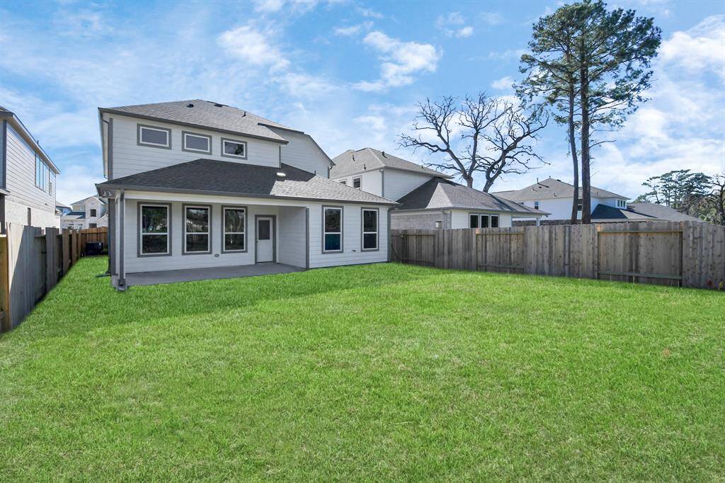 Come and see this spacious backyard with its beautiful covered patio. There is plenty ofroom for the kids to play and adults to relax. Perfect for your outdoor living space, patiofurniture, bbq pit, and so much more. The possibilities are endless! Sample photo of completed home with similar floor plan. Actual colors and selections may vary.