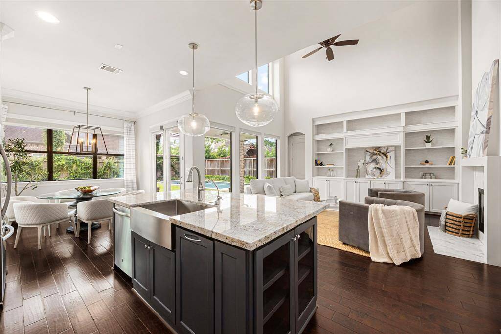 Enjoy views of the pool and landscaped yard.