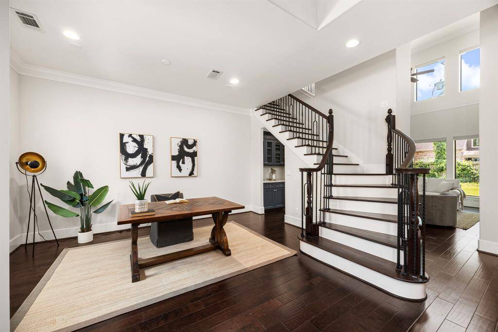 Grand entrance! Use this space for an office, lounge, or formal dining.